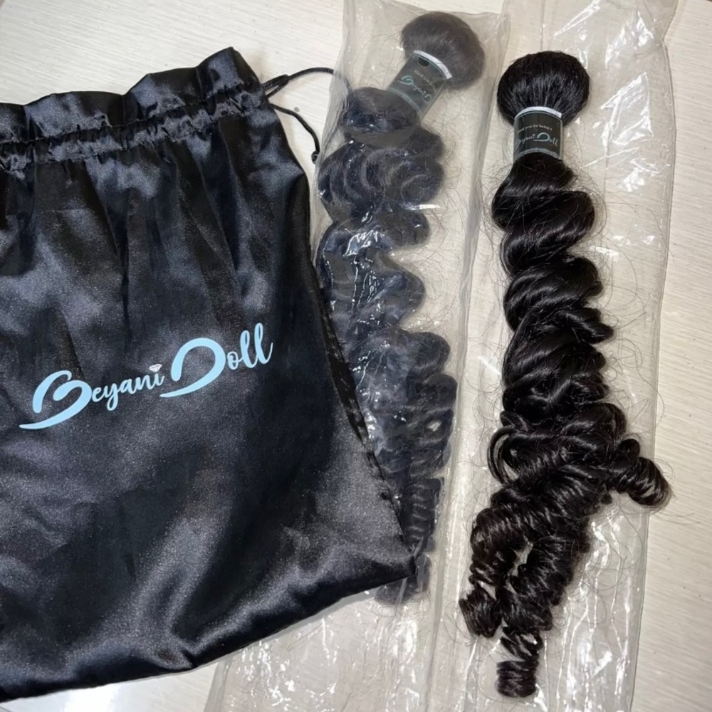 Two 38 inch curly bundles beyani hair